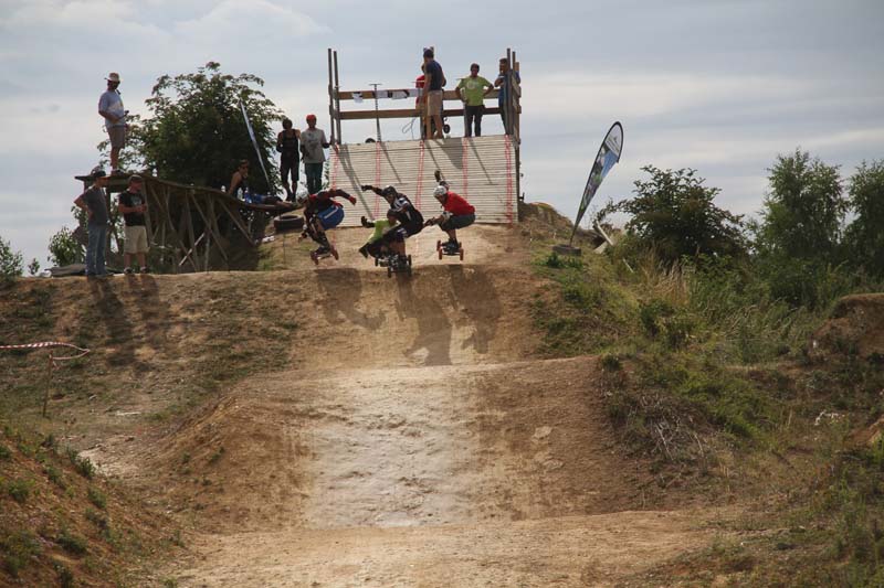 Masters riding the boardercross course